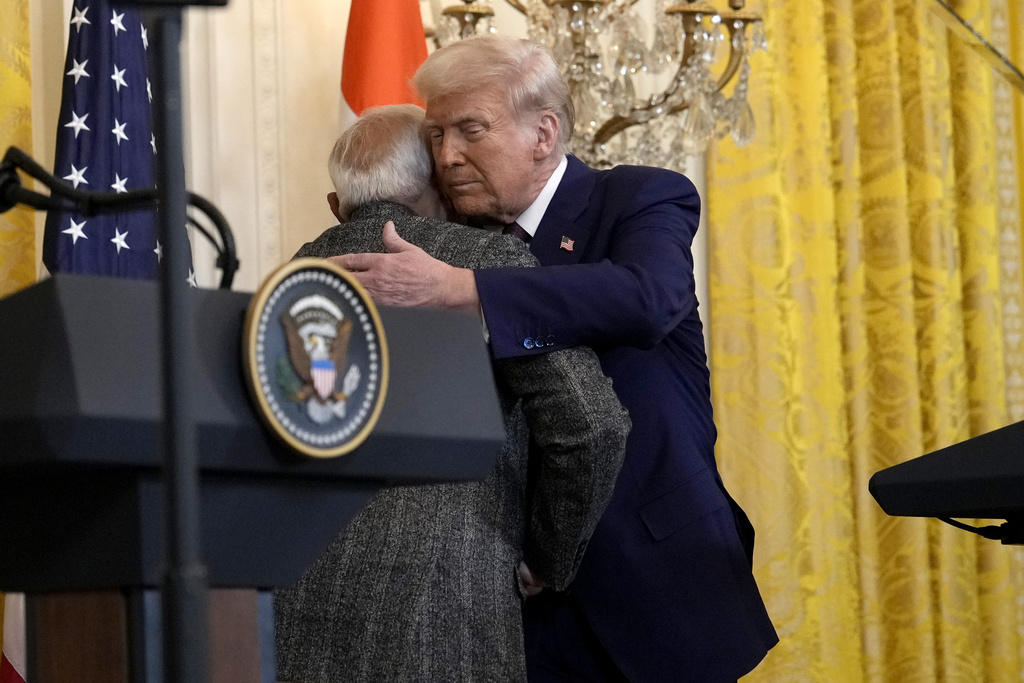 FILE - President Donald Trump, right, hugs India's Prime Minister Narendra Modi during a news conference in the East Room of the White House, Feb. 13, 2025, in Washington. (AP Photo/Ben Curtis, File)