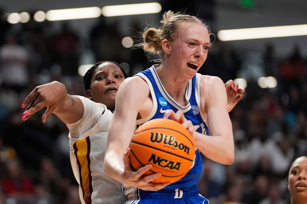 FILE - Duke forward Toby Fournier pulls down rebound against South Carolina guard MiLaysia Fulwiley during the second half in the Elite Eight of the NCAA college basketball tournament, Sunday, March 30, 2025. in Birmingham, Ala. (AP Photo/Gerald Herbert, File)