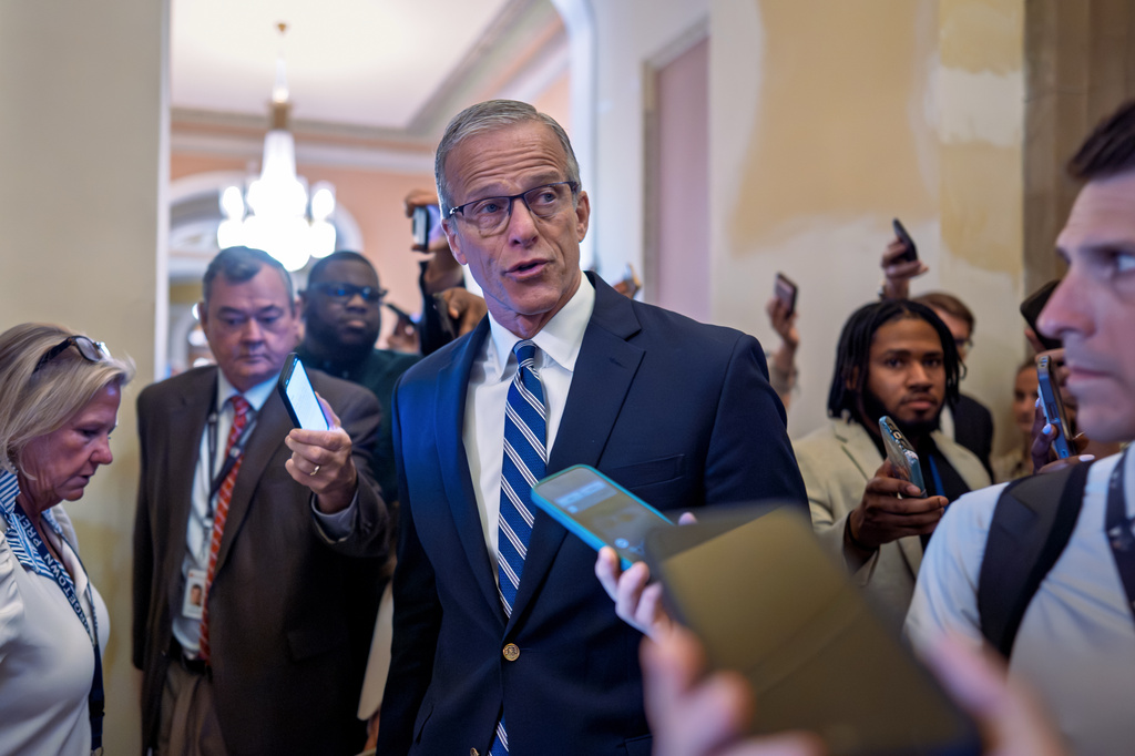 Senate Majority Leader John Thune, R-S.D., pauses for questions from reporters before votes on the immigration enforcement funding package, at the Capitol in Washington, Thursday, June 4, 2026. (AP Photo/J. Scott Applewhite)