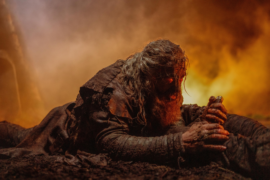 This image released by A24 shows Hugh Jackman in a scene from "The Death of Robin Hood." (Aidan Monaghan/A24 via AP)