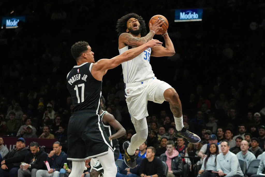 Dallas Mavericks' Marvin Bagley III (35) =do=Brooklyn Nets' Michael Porter Jr. (17) during the first half of an NBA basketball game Tuesday, Feb. 24, 2026, in New York. (AP Photo/Frank Franklin II)