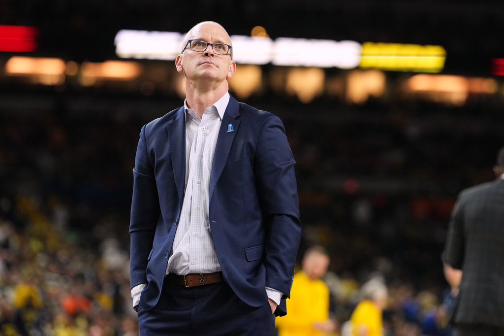 FILE - UConn head coach Dan Hurley pauses during a time out in the second half of an NCAA college basketball tournament national championship game against Michigan at the Final Four, April 6, 2026, in Indianapolis. (AP Photo/Michael Conroy, File)