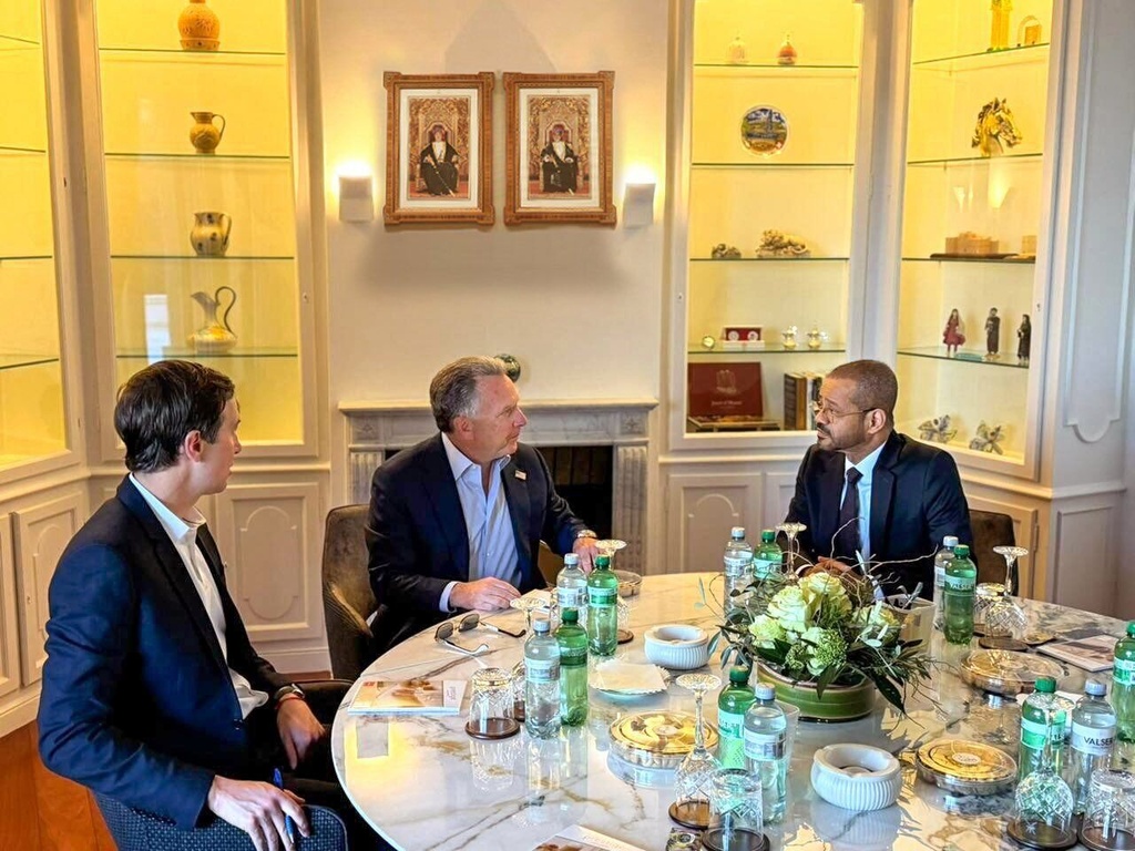 Oman's Minister of Foreign Affairs Sayyid Badr bin Hamad Al Busaidi, right, holds a meeting with White House special envoy Steve Witkoff, center, and Jared Kushner, as part of the ongoing Iranian-American negotiations, in Geneva, Thursday Feb. 26, 2026. (Foreign Ministry of Oman via AP)