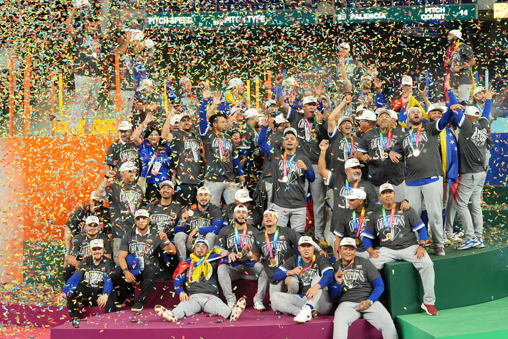 The Venezuela team celebrates after defeating the United States in the championship game of the World Baseball Classic, Tuesday, March 17, 2026, in Miami. (AP Photo/Rebecca Blackwell)