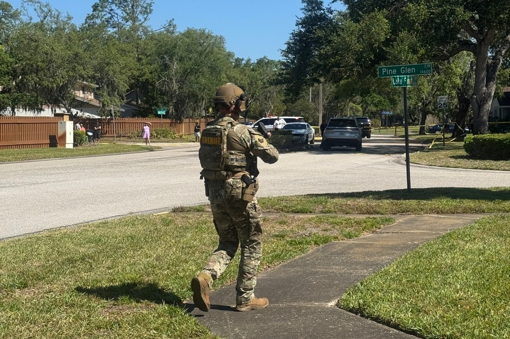 The Hillsborough County Sheriff's Office responds to a neighborhood close to the University of South Florida campus, on Friday, April 24, 2026 in Tampa, Fla. (Hillsborough County Sheriff's Office via AP)