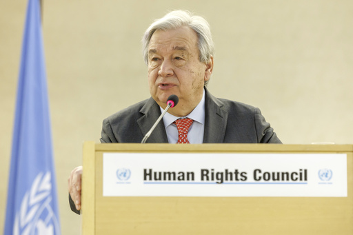 U.N. Secretary-General Antonio Guterres delivers his remarks, during the opening of the High-Level Segment of the 55th session of the Human Rights Council at the European headquarters of the United Nations in Geneva, Switzerland, Monday, Feb. 26, 2024. (Salvatore Di Nolfi/Keystone via AP)