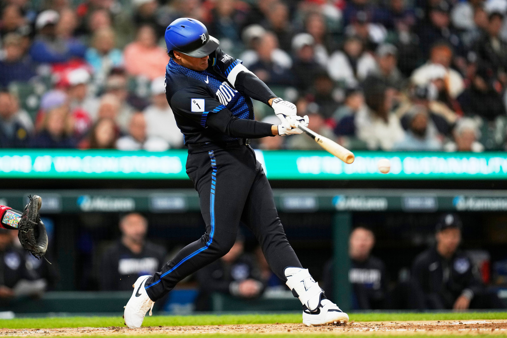 Detroit Tigers' Eduardo Valencia hits a double against the Washington Nationals during the third inning of a baseball game Monday, Sept. 21, 2026, in Detroit. (AP Photo/Paul Sancya)