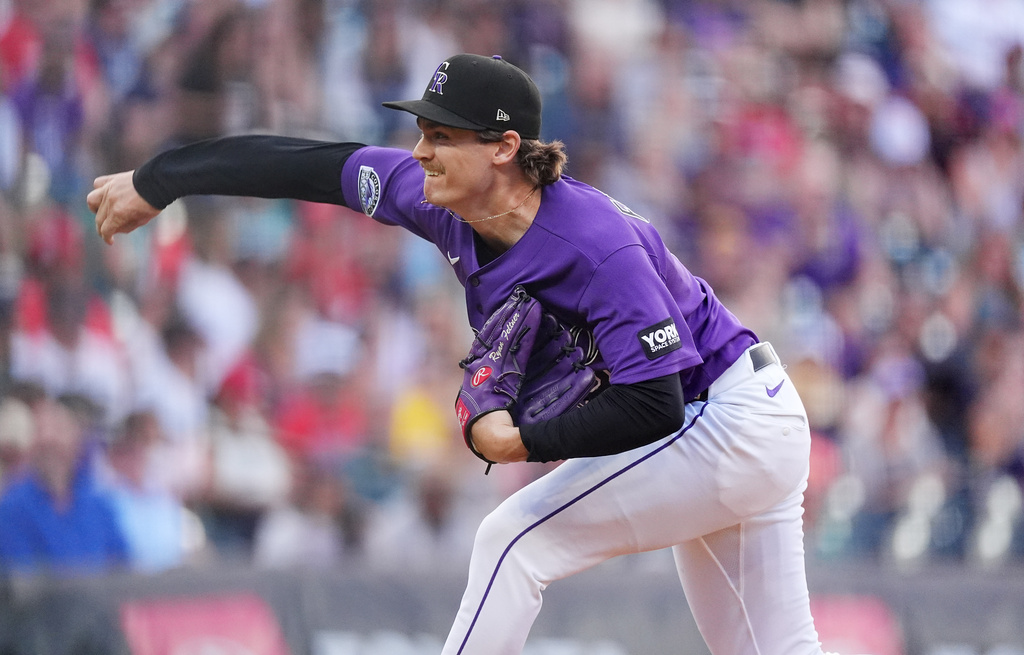 Colorado Rockies starting pitcher Ryan Feltner works against the Boston Red Sox in the first inning of a baseball game Monday, June 22, 2026, in Denver. (AP Photo/David Zalubowski)
