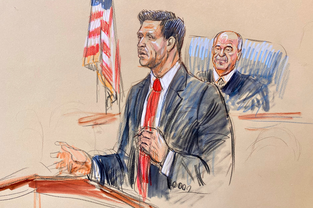This courtroom sketch depicts defense attorney Geremy Kamens speaking as Judge Anthony J. Trenga listens during the opening day of the trial for alleged Islamic State militant Mohammad Sharifullah in federal court in Alexandria, Va., Monday, April 20, 2026. (Dana Verkouteren via AP)