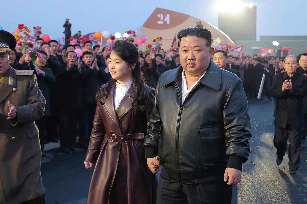 FILE - In this photo provided by the North Korean government, North Korean leader Kim Jong Un, center right, and his daughter attend a completion and operation ceremony of Kangdong Greenhouse Farm in Pyongyang, North Korea, March 15, 2024. Independent journalists were not given access to cover the event depicted in this image distributed by the North Korean government. The content of this image is as provided and cannot be independently verified. (Korean Central News Agency/Korea News Service via AP, File)