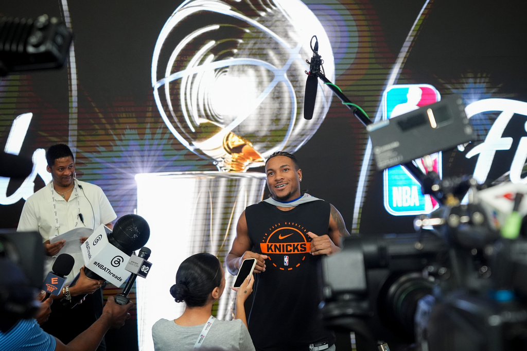 New York Knicks guard Miles McBride talks with the media before a workout prior to the start of the NBA Finals basketball series against the San Antonio Spurs, Tuesday, June 2, 2026, in San Antonio. (AP Photo/Eric Gay)