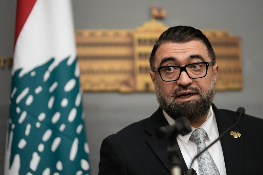 Syrian Justice Minister Mazhar al‑Wais, speaks during a press conference after he signed an agreement for the transfer of Syrian prisoners currently in Lebanese prisons to Syria, in Beirut, Lebanon, Friday, Feb. 6, 2026. (AP Photo/Hussein Malla)