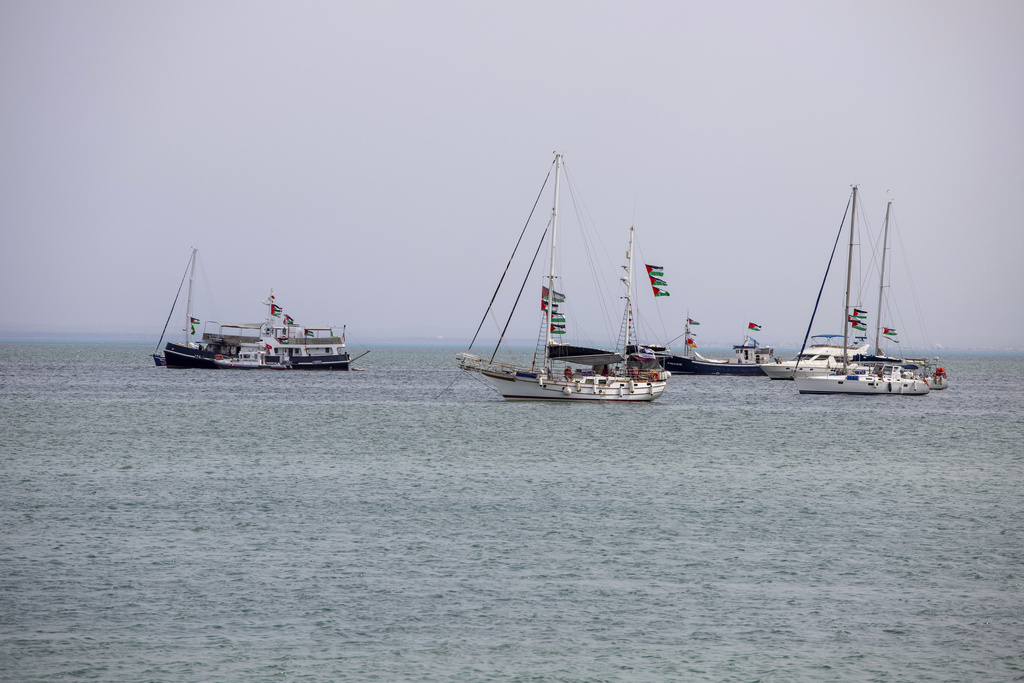 Ships that are part of the Global Sumud Flotilla heading to Gaza are anchored off the coast of Sidi Bou Said in Tunis, Tunisia, Tuesday, Sept. 9, 2025. (AP Photo/Anis Mili)