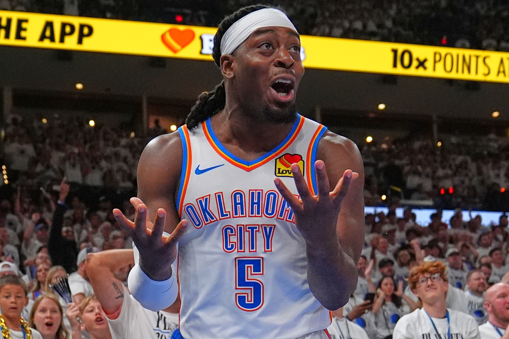 FILE - Oklahoma City Thunder guard Luguentz Dort (5) reacts to a foul in the second half of Game 5 in the Western Conference finals NBA basketball playoffs series against the San Antonio Spurs, May 26, 2026, in Oklahoma City. (AP Photo/Julio Cortez, File)