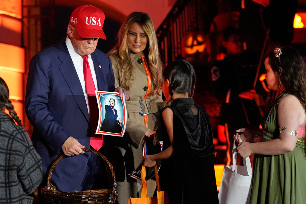 President Donald Trump and first lady Melania Trump participate in a Halloween at the White House event on the South Lawn, Thursday, Oct. 30, 2025, in Washington. (AP Photo/Alex Brandon)