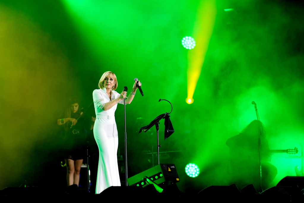 FILE - Iranian pop star Googoosh performs during a concert at the Dubai Expo 2020, in Dubai, United Arab Emirates, March 17, 2022. (AP Photo/Ebrahim Noroozi, File)