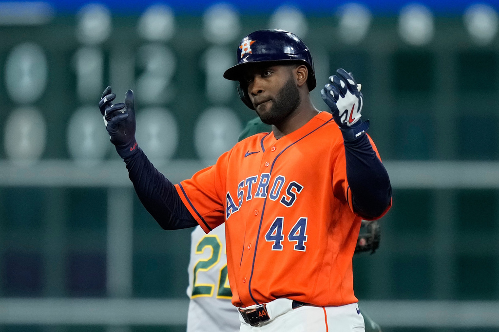 Houston Astros' Yordan Alvarez celebrates after hitting an RBI double during the seventh inning of a baseball game against the Athletics, Friday, Aug. 21, 2026, in Houston. (AP Photo/Kevin M. Cox)