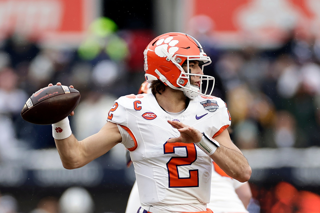 Clemson quarterback Cade Klubnik (2) passes the ball during the first half of the Pinstripe Bowl NCAA college football game against Penn State at Yankee Stadium Saturday, Dec. 27, 2025, in New York. (AP Photo/Adam Hunger)