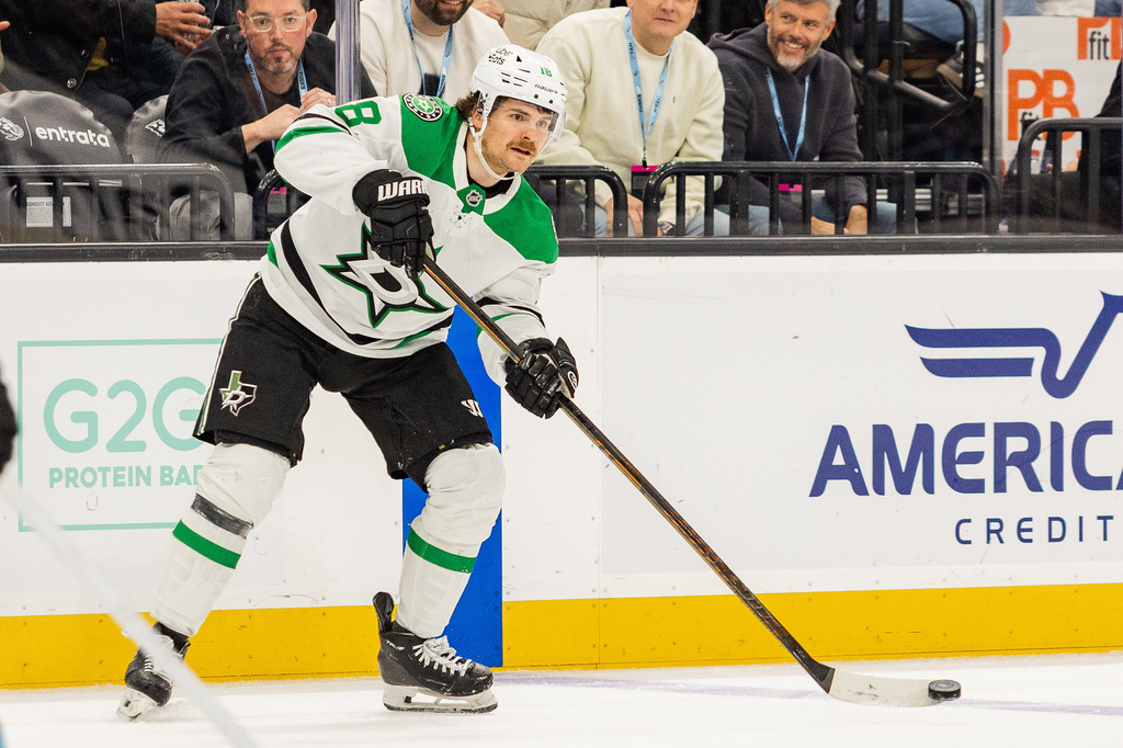FILE - Dallas Stars center Sam Steel passes the puck against the Utah Mammoth during the second period of an NHL hockey game, Jan. 31, 2026, in Salt Lake City. (AP Photo/Melissa Majchrzak, File)