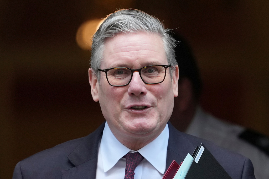 Britain's Prime Minister Keir Starmer departs 10 Downing Street to go to the House of Commons for his weekly Prime Minister's Questions in London, Wednesday, Feb. 4, 2026. (AP Photo/Alastair Grant)