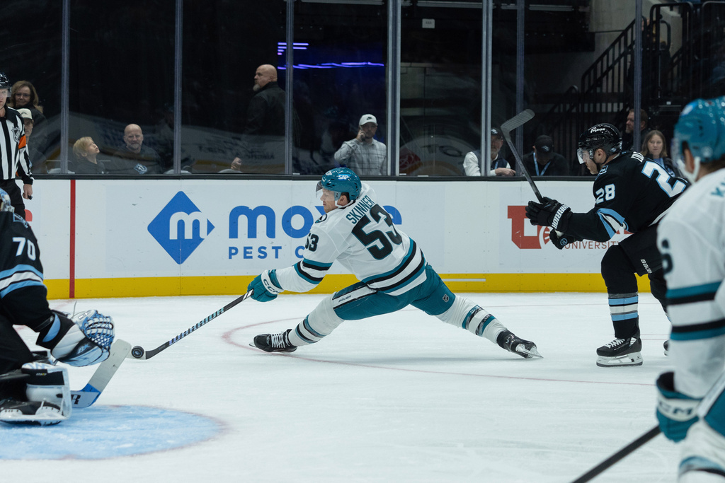 San Jose Sharks left wing Jeff Skinner (53) goes to shoot the puck against Utah Mammoth goalie Karel Vejmelka (70) during the first period of an NHL hockey game Friday, Oct. 17, 2025, in Salt Lake City. (AP Photo/Melissa Majchrzak)