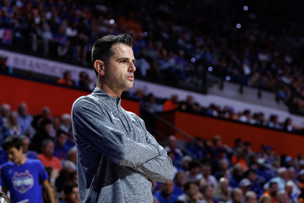 Florida head coach Todd Golden watches from the sidelines during the first half of an NCAA college basketball game against South Carolina, Tuesday, Feb. 17, 2026, in Gainesville, Fla. (AP Photo/Chris Watkins)