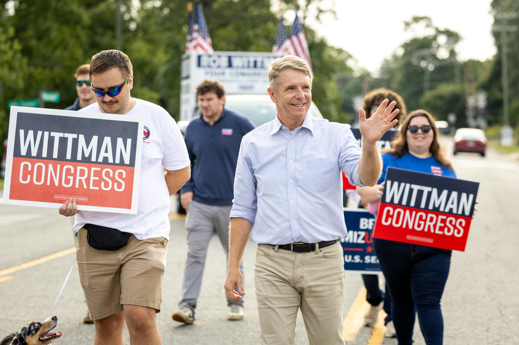 Rep. Rob Wittman, R-Va., waves during the 30th annual Glen Allen Day parade on Saturday, Sept. 19, 2026, in Glen Allen, Va. (AP Photo/Mike Kropf)