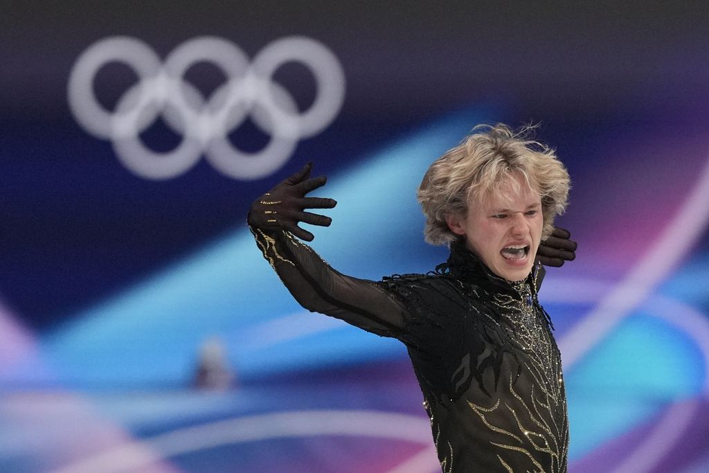 Ilia Malinin of the United States competes during the figure skating men's team event at the 2026 Winter Olympics, in Milan, Italy, Sunday, Feb. 8, 2026. (AP Photo/Stephanie Scarbrough)