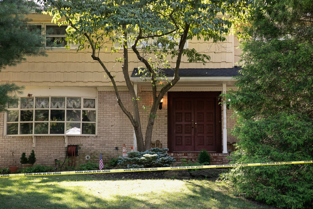 FILE - Crime scene tape surrounds the home of U.S. District Judge Esther Salas in North Brunswick, N.J., on Monday, July 20, 2020, after a gunman posing as a delivery person shot and killed Salas' 20-year-old son and wounded her husband Sunday evening. (AP Photo/Mark Lennihan, File)