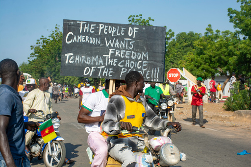 Supporters of opposition presidential candidate Issa Tchiroma, protest on the streets of Garoua, Cameroon, Sunday, Oct. 26, 2025. (AP Photo/Welba Yamo Pascal) Supporters of opposition presidential candidate Issa Tchiroma, protest on the streets of Garoua, Cameroon, Sunday, Oct. 26, 2025. (AP Photo/Welba Yamo Pascal)