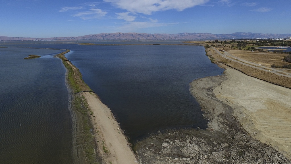 The Pond A1 site, center, for the South Bay Salt Pond Restoration Project is photographed Thursday, Aug. 7, 2025, in Mountain View, Calif. (AP Photo/Godofredo A. Vásquez)