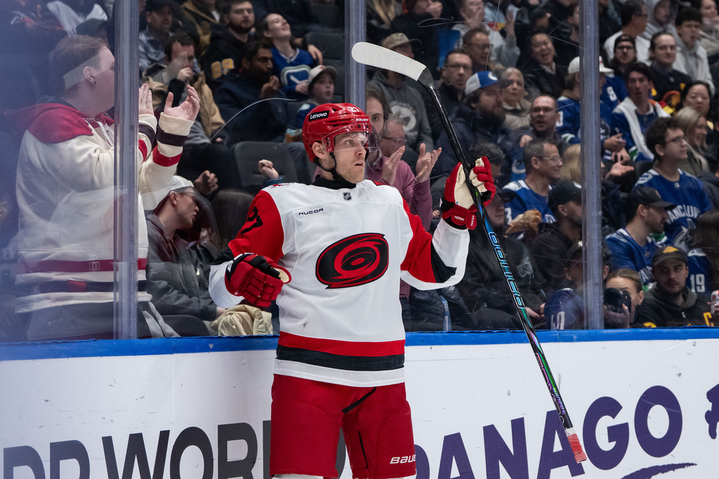 Carolina Hurricanes' Nikolaj Ehlers celebrates his goal against the Vancouver Canucks during the second period of an NHL hockey game in Vancouver, on Wednesday, March 4, 2026. (Ethan Cairns/The Canadian Press via AP)