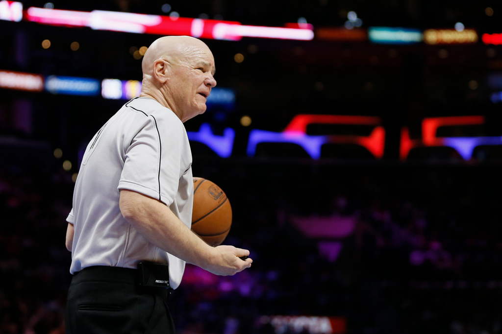 FILE - NBA official Joey Crawford is seen during an NBA basketball game between the Los Angeles Clippers and Milwaukee Bucks, Dec. 20, 2014, in Los Angeles. (AP Photo/Danny Moloshok, File)