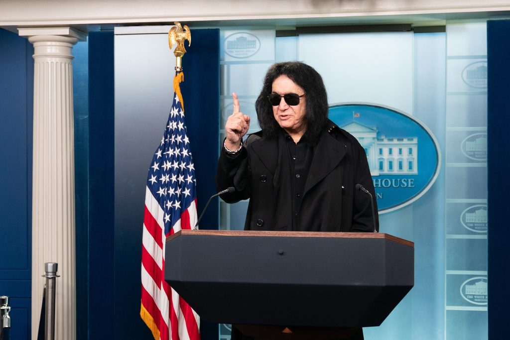 Kiss band member Gene Simmons speaks to members of the media at the White House, Friday, Dec. 5, 2025, in Washington. (AP Photo/Allison Robbert)