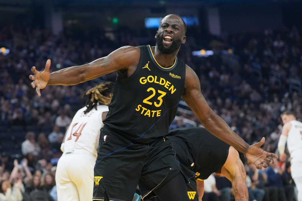 Golden State Warriors forward Draymond Green (23) gestures toward an official during the first half of an NBA basketball game against the Cleveland Cavaliers in San Francisco, Thursday, April 2, 2026. (AP Photo/Jeff Chiu)