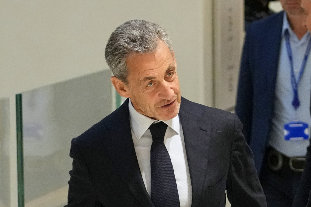 Former French President Nicolas Sarkozy arrives at the courthouse, in Paris, France, Thursday, Sept. 25, 2025. (AP Photo/Christophe Ena)