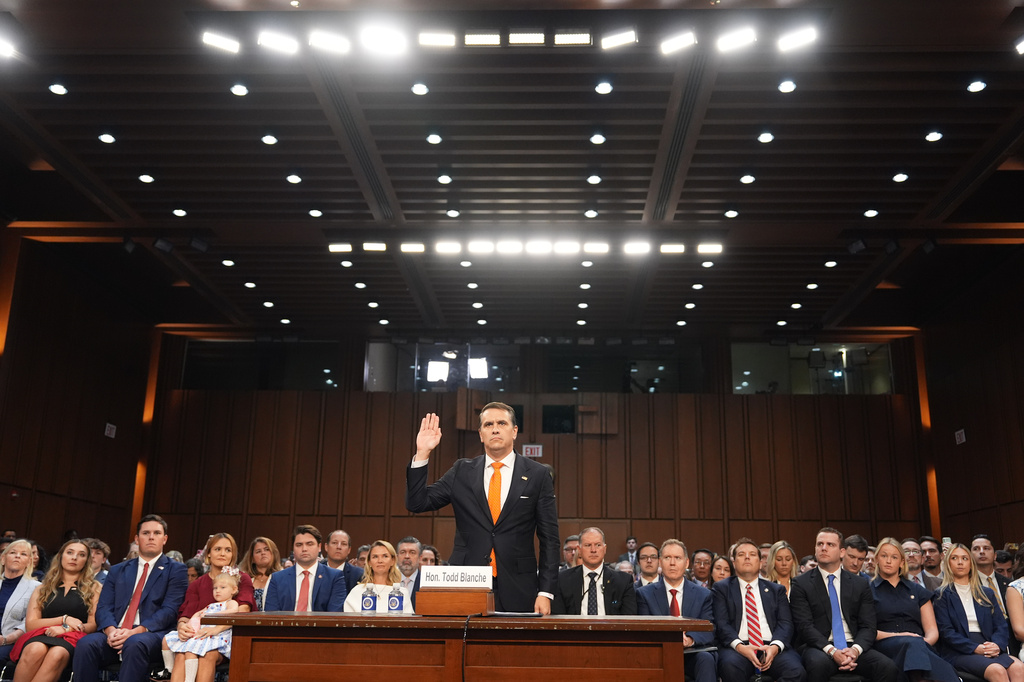 Acting Attorney General Todd Blanche is sworn in as he appears before the Senate Judiciary Committee on Capitol Hill in Washington, Wednesday, July 15, 2026. (AP Photo/Mark Schiefelbein)