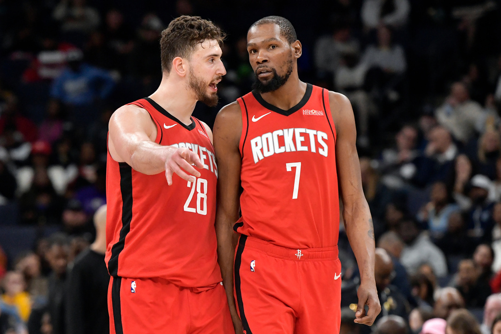 Houston Rockets center Alperen Sengun (28) talks with forward Kevin Durant (7) in the second half of an NBA basketball game against the Memphis Grizzlies Friday, March 27, 2026, in Memphis, Tenn. (AP Photo/Brandon Dill)