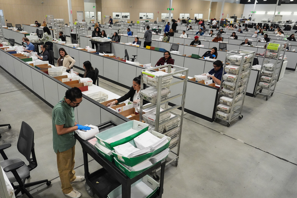 Ballots are inspected the day after California's primary election at the Los Angeles County Ballot Processing Center Wednesday, June 3, 2026, in City of Industry, Calif. (AP Photo/Jae C. Hong)