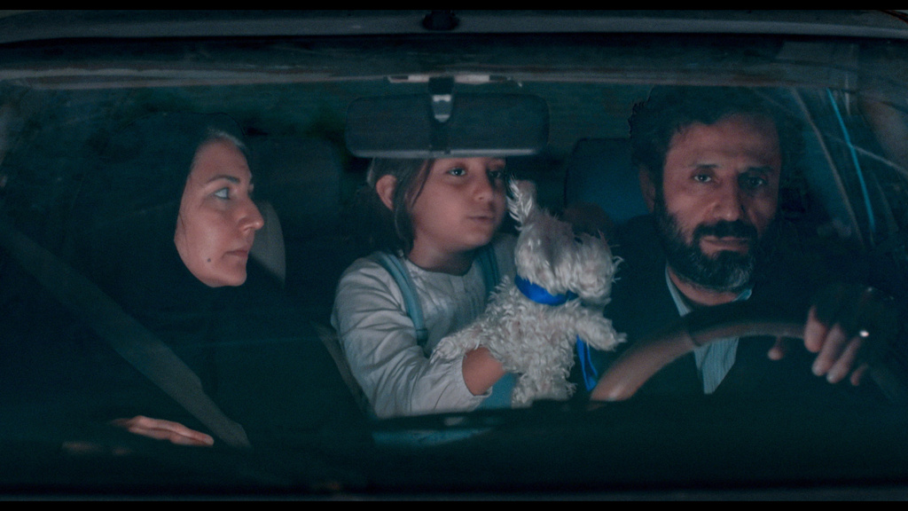 This image released by Neon shows, from left, Afssaneh Najmabadi, Delmaz Najafi, and Ebrahim Azizi in a scene from "It Was Just an Accident." (Neon via AP)