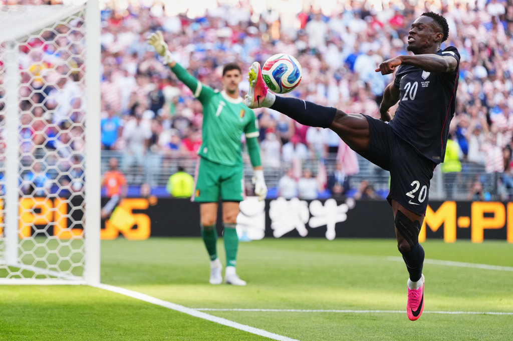United States' Folarin Balogun tries to control the ball during the World Cup round of 16 soccer match against Belgium in Seattle, Monday, July 6, 2026. (AP Photo/Manu Fernandez)