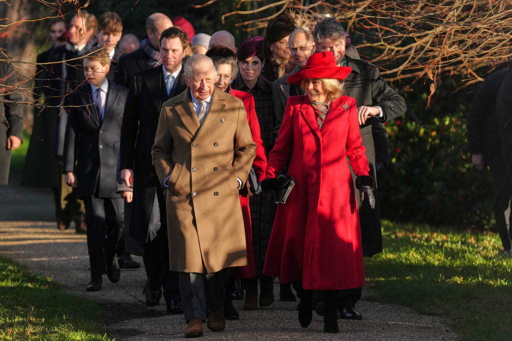 Britain's King Charles III and Queen Camilla arrive to attend the Christmas Day service at St Mary Magdalene Church in Sandringham, Norfolk, England, Thursday, Dec. 25, 2025.(AP Photo/Jon Super)