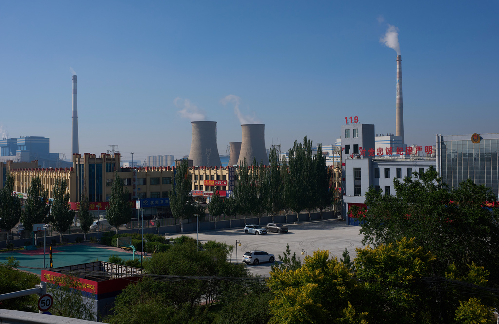 A power plant opereates near Baotou in northern China's Inner Mongolia province on Saturday, June 13, 2026. (AP Photo/Ng Han Guan)