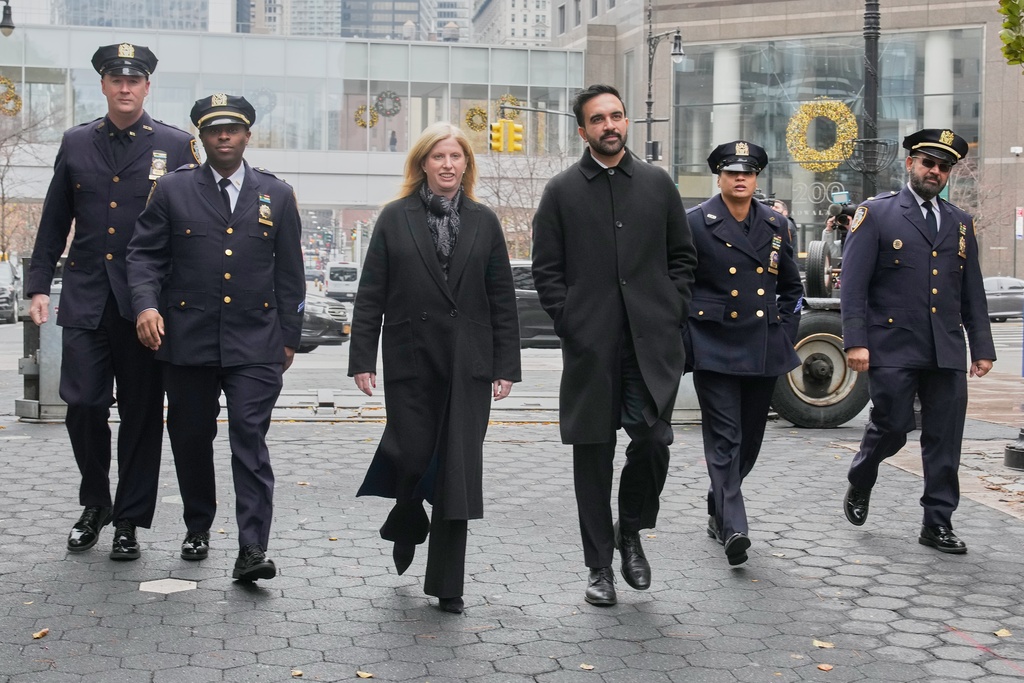 New York Mayor-elect Zohran Mamdani and New York City Police Commissioner Jessica Tisch walk to the New York City Police Memorial, Wednesday, Nov. 19, 2025. (AP Photo/Richard Drew)