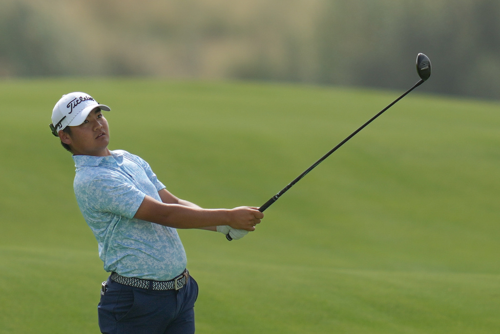 Kazuma Kobori of New Zealand watches after playing his second shot on the 16th hole during the first round of Abu Dhabi Golf Championship in Abu Dhabi, United Arab Emirates, Thursday, Nov. 6, 2025. (AP Photo/Altaf Qadri)