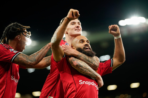 Manchester United's Bryan Mbeumo, front, celebrates with Benjamin Sesko after scoring his side's third goal during the English Premier League soccer match between Manchester United and Brighton & Hove Albion in Manchester, England, Saturday, Oct. 25, 2025. (AP Photo/Dave Thompson) Manchester United's Bryan Mbeumo, front, celebrates with Benjamin Sesko after scoring his side's third goal during the English Premier League soccer match between Manchester United and Brighton & Hove Albion in Manchester, England, Saturday, Oct. 25, 2025. (AP Photo/Dave Thompson)