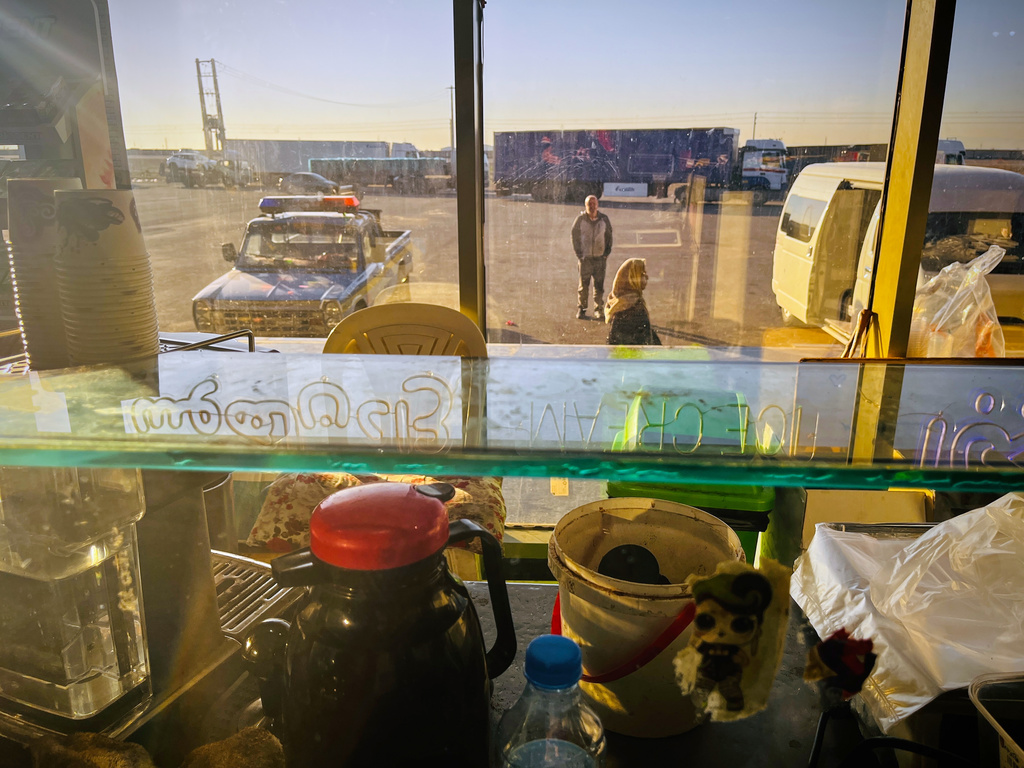 Cars and trucks line up at a gas station as seen from a roadside café on Road 2 between Tehran and Takestan, Iran, Thursday, April 9, 2026. (AP Photo/Francisco Seco)