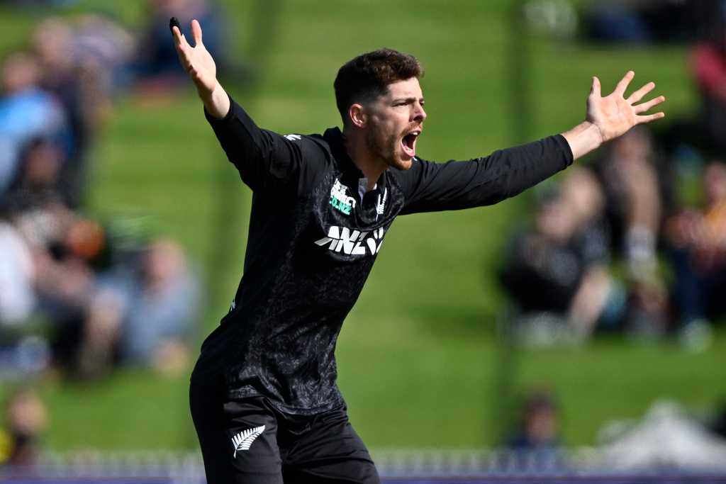 New Zealand's Mitchell Santner unsuccessfully appeal for a decision against England during their T20 cricket match in Hamilton, New Zealand, Wednesday, Oct. 29, 2025. (Andrew Cornaga/Photosport via AP)