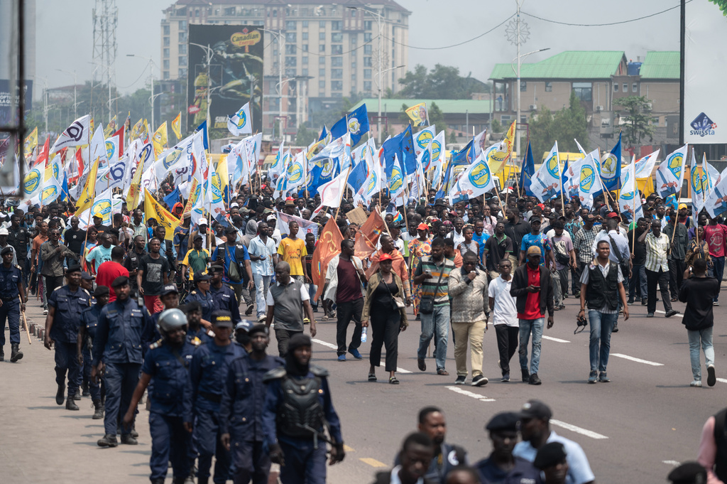 People march during a protest organized by opposition parties against constitutional changes proposed by President Felix Tshisekedi, in Kinshasa, Congo, Tuesday, Sept. 15, 2026. (AP Photo/Samy Ntumba Shambuyi)