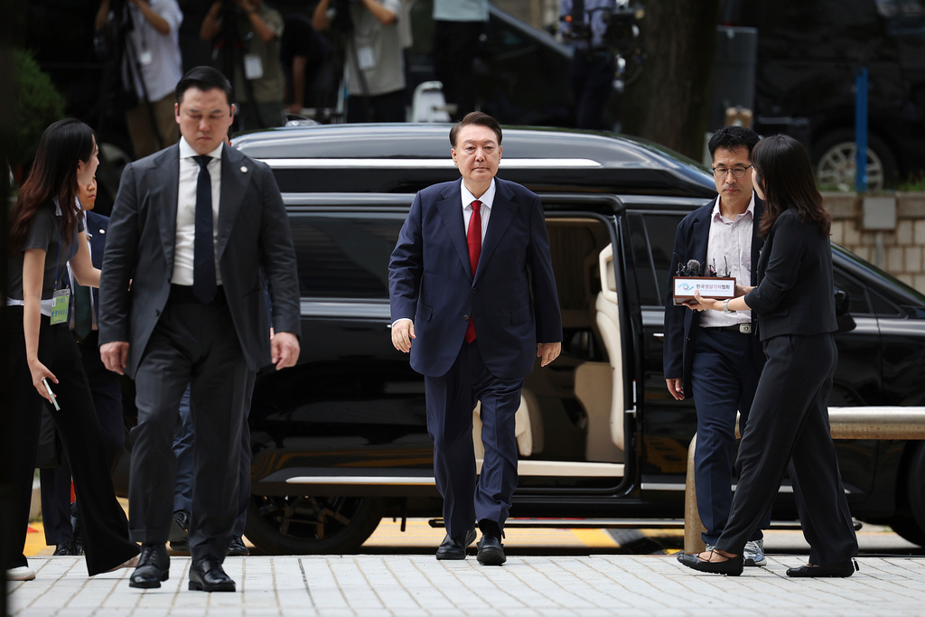FILE - Former South Korean President Yoon Suk Yeol, centerm arrives at a court to attend a hearing to review his arrest warrant requested by special prosecutors in Seoul, South Korea, July 9, 2025. (Kim Hong-Ji/Pool Photo via AP, File)